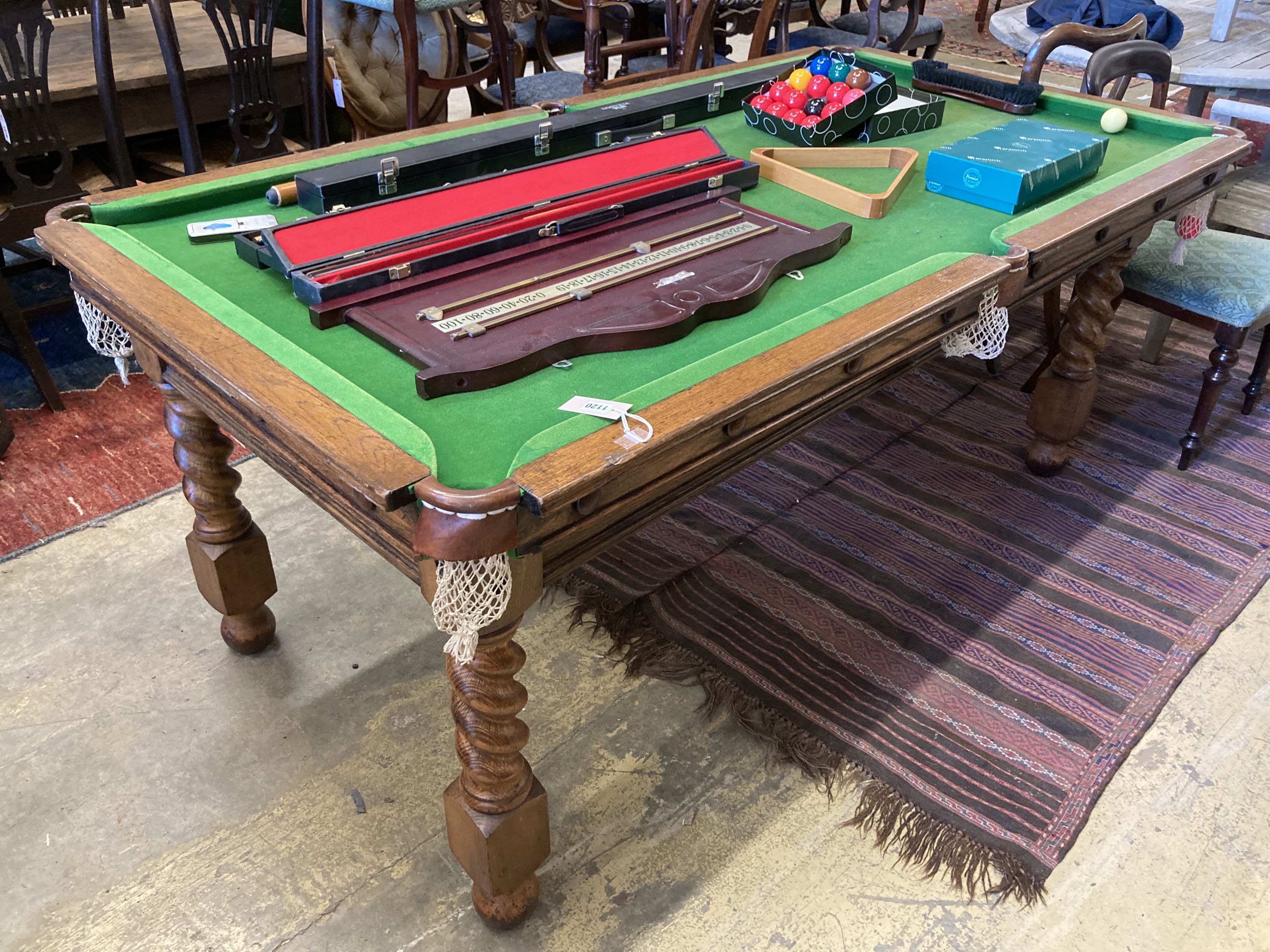 An early 20th century oak Jelks & Son snooker/dining table with full accessories, length 200cm, depth 102cm, height 79cm